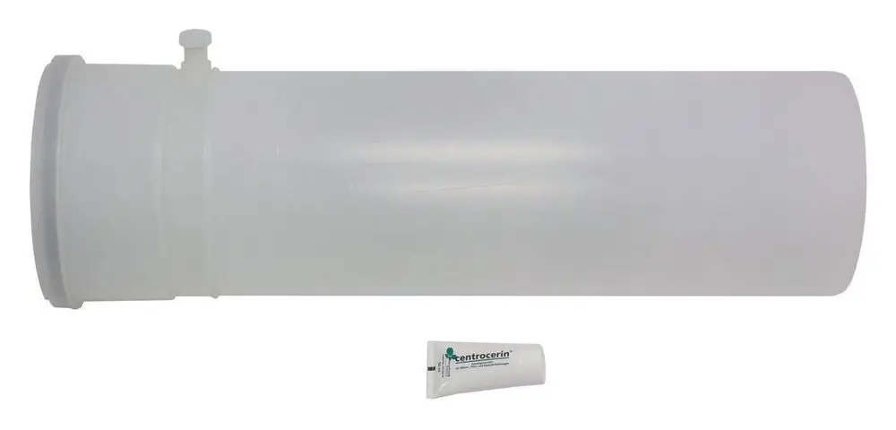 Transparenter Kunststoffzylinder mit einem Anschlussstück, gekennzeichnet für die Verwendung mit Vaillant-Geräten. Enthält eine Tube Entrocerin für die Montage.